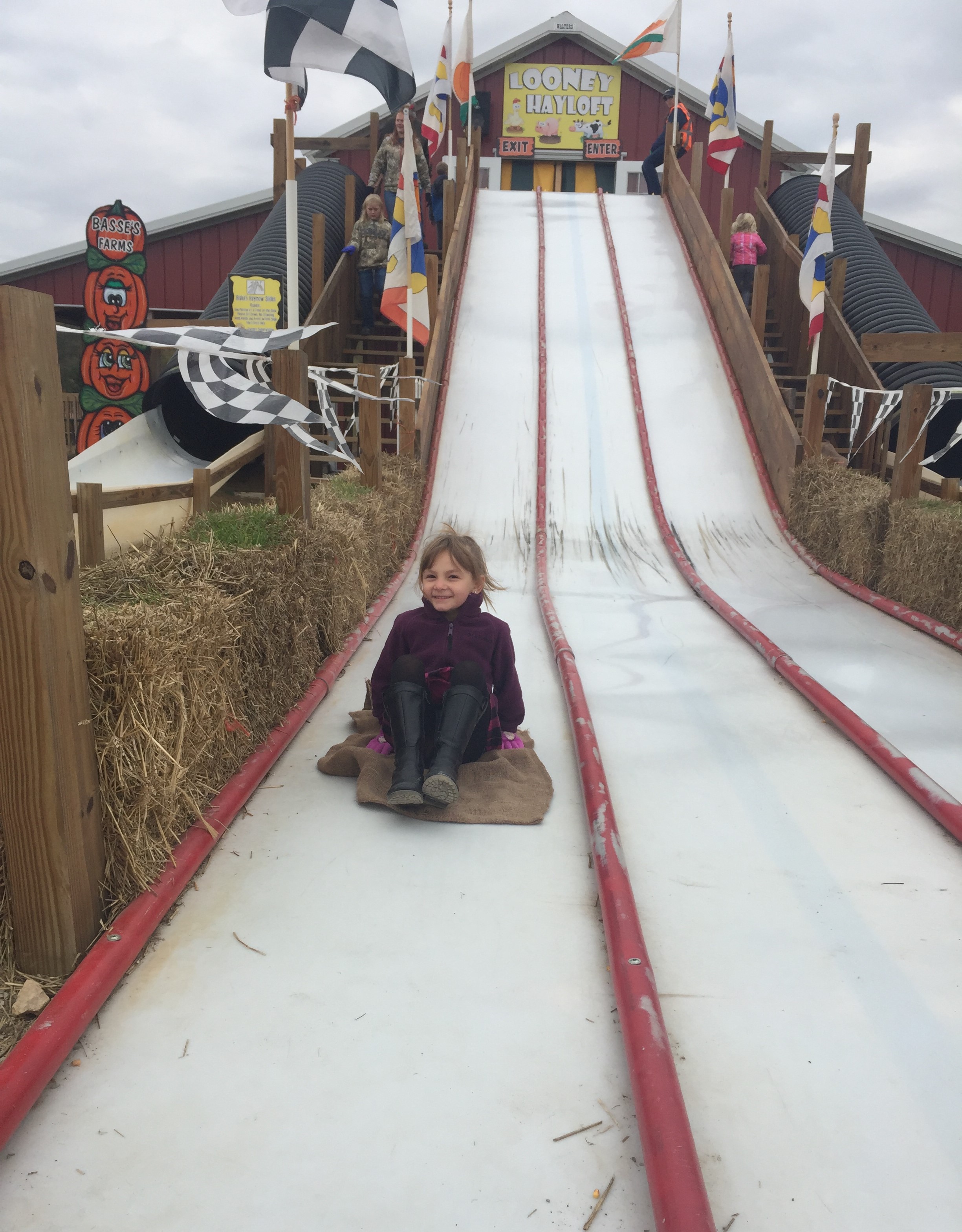 Emma going down slide